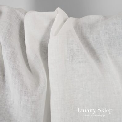 Jakościowa, lekka, gęsto tkana mlecznobiała (żółtawa) tkanina lniana.