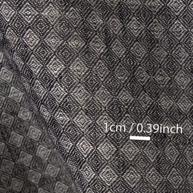 Tkanina lniana wyktana w nieduże czarno - szare romby.