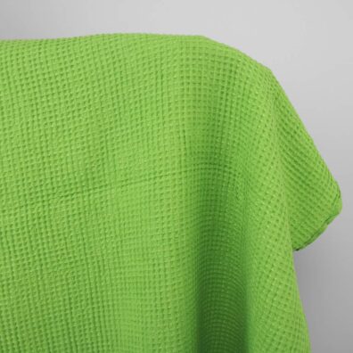 Jasnozielona (sałatowa) tkanina lniano - bawełniana wytkana splotem waflowym (wypukłe okienka)