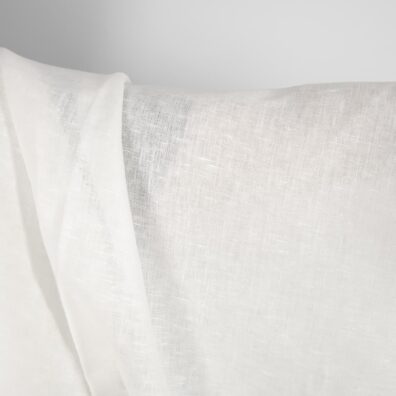 Mlecznobiała tkanina lniana.