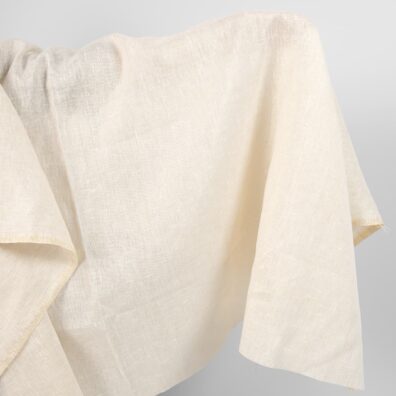 Lniana tkanina złocisty połysk.