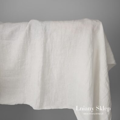 Lniana tkanina mlecznobiała, szeroka, prana.
