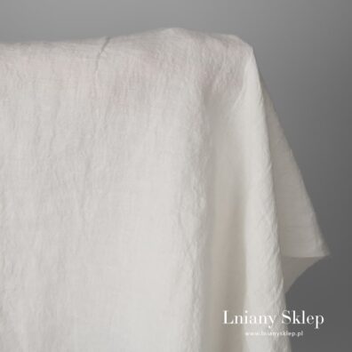 Szeroka (ok. 295cm) mlecznobiała (lekko żółtawa) tkanina lniana.