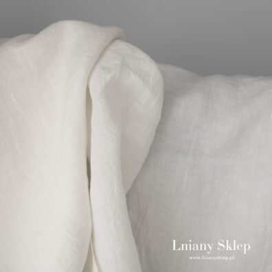 Szeroka, mlecznobiała tkanina lniana.