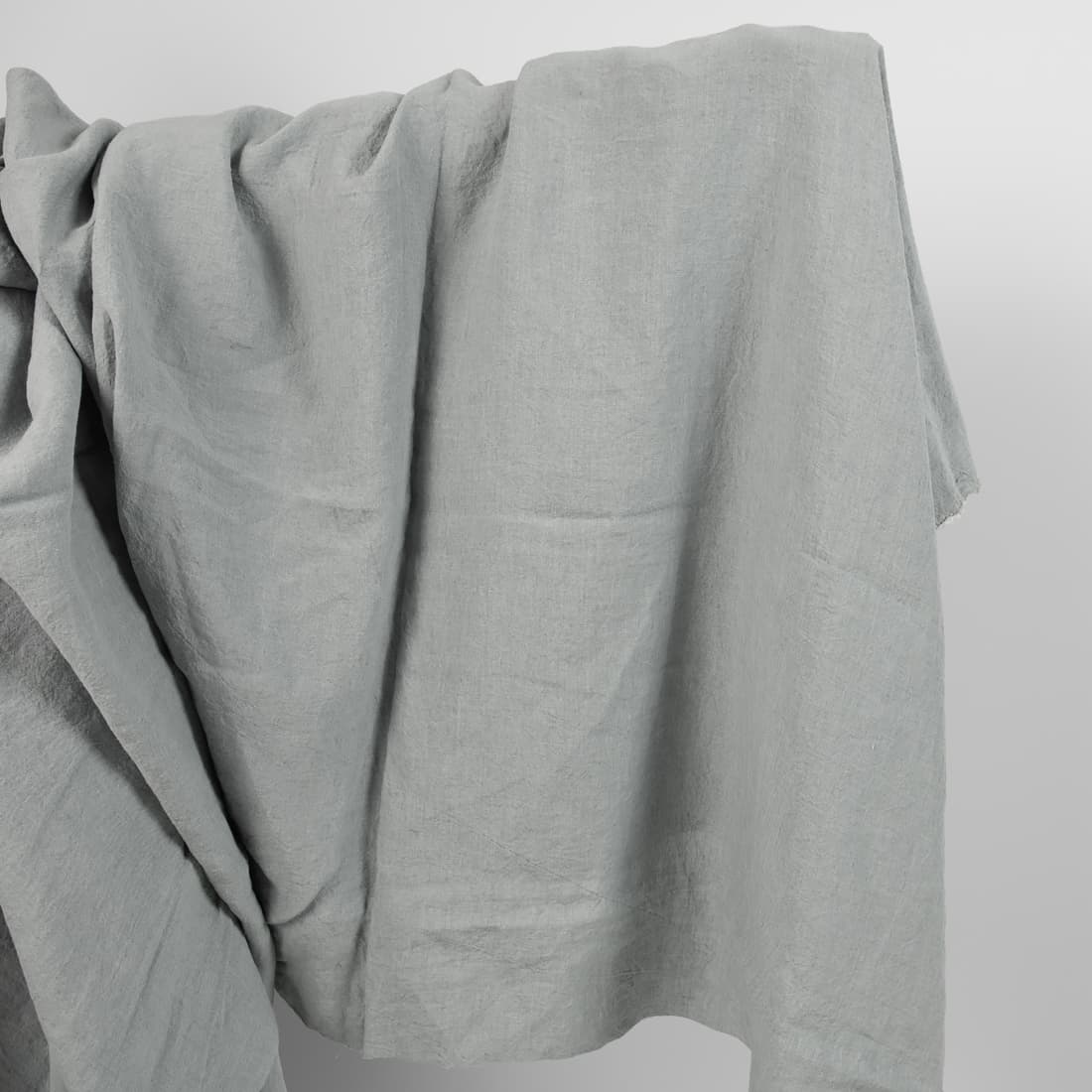 Lniana tkanina szara niebieskawa, szeroka, prana.