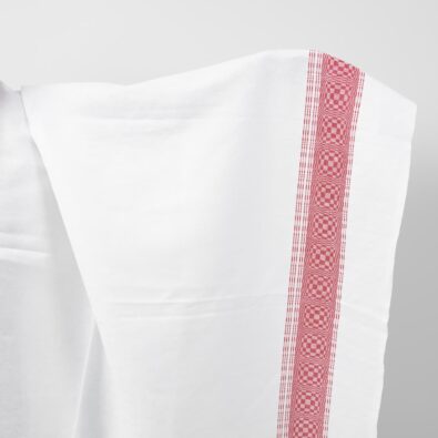 Biała w czerwone ornamenty – szlaki tkanina