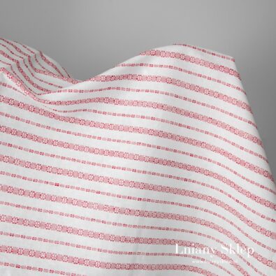 Biała tkanina lniano - bawełniana w czerwone szlaczki.