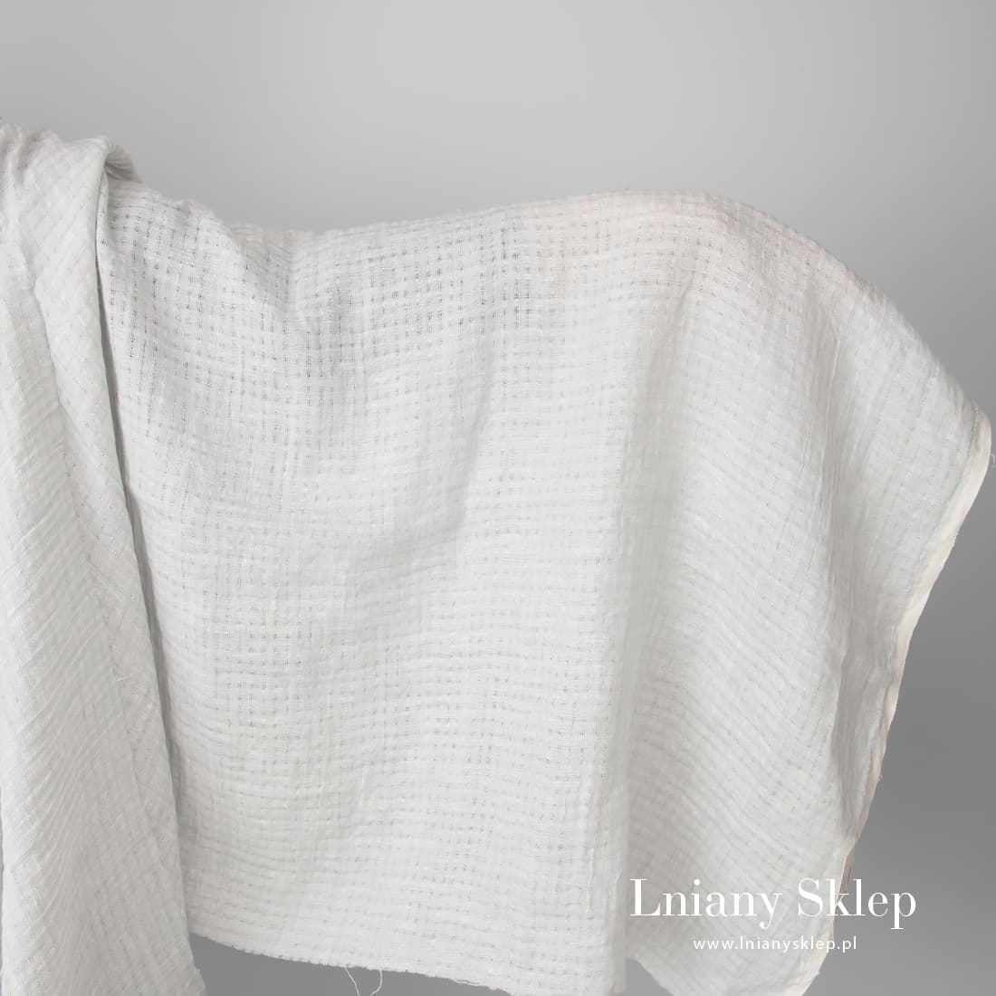 Prana tkanina lniana szara, ażurowa.