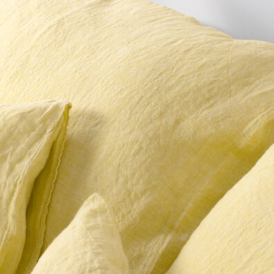 Tkanina wytkana z żółtej i białej przędzy.