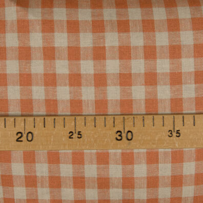 Lniana tkanina pomarańczowo – szara kratka.