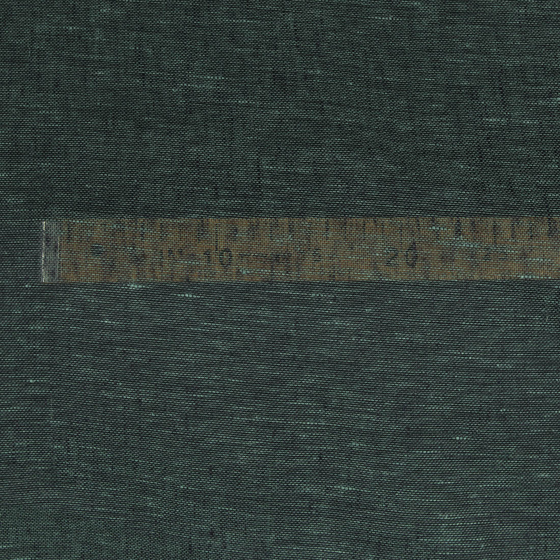 Lniana tkanina przeźroczysta ciemna zielona.