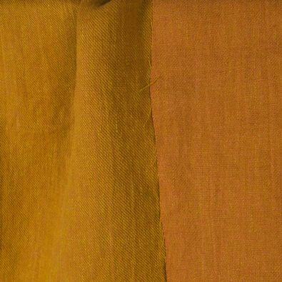 Pomarańczowa lniana dwustronna prana tkanina.