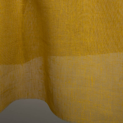 Żółta przeźroczysta tkanina lniana.