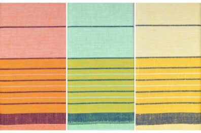 Pomarańczowa, zielona i żółta ścierki kuchenne.