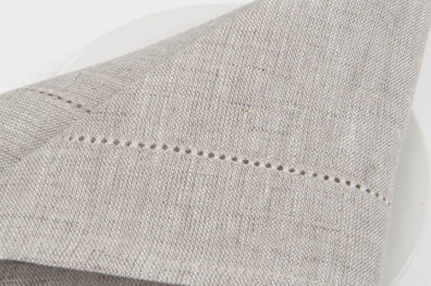 Mereżkowana lniana jasnoszara bankietówka.