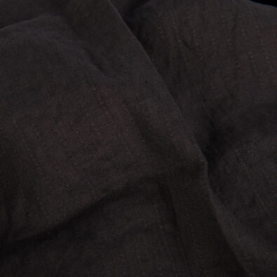 Prana ciemnoszara tkanina lniana.