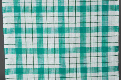 Tkanina lniano - bawełniana w zielono - białą kratkę.