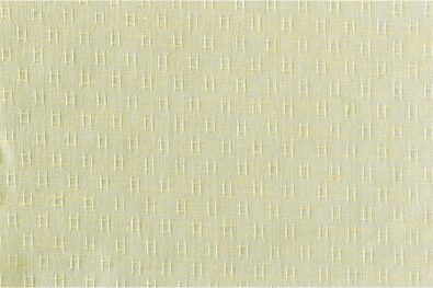 Jasna żółta tkanina w drobny deseń