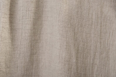 Jasnoszara prana tkanina lniana wzór waflowy.