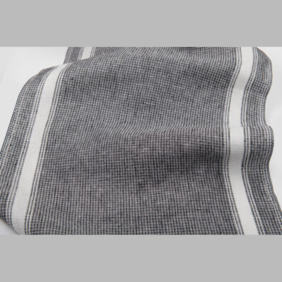 Lniana ścierkowa czarno - biała tkanina waflowa.