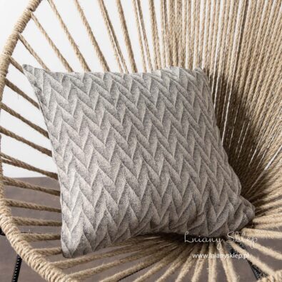 Lniana poszewka dekoracyjna w szare zygzaki.