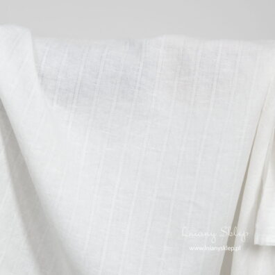 Biała lniano - bawełniana tkanina prana w paski.