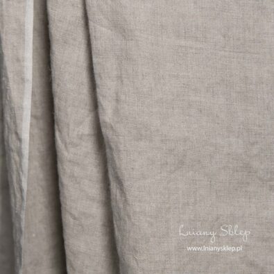 Lniana tkanina prana niebarwiona jasna.