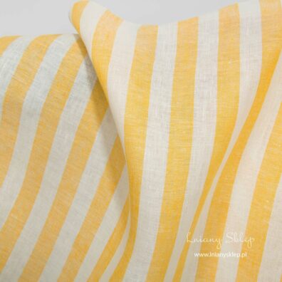 Lniana tkanina w żółte jaskrawe pasy.