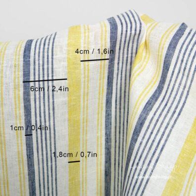 Len ścierkowy biały w paski o różnej szerokości.