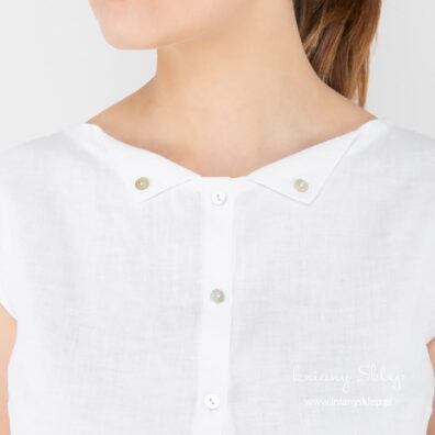 Biała bluzka lniana. |Zapina się na guziczki z masy perłowej.