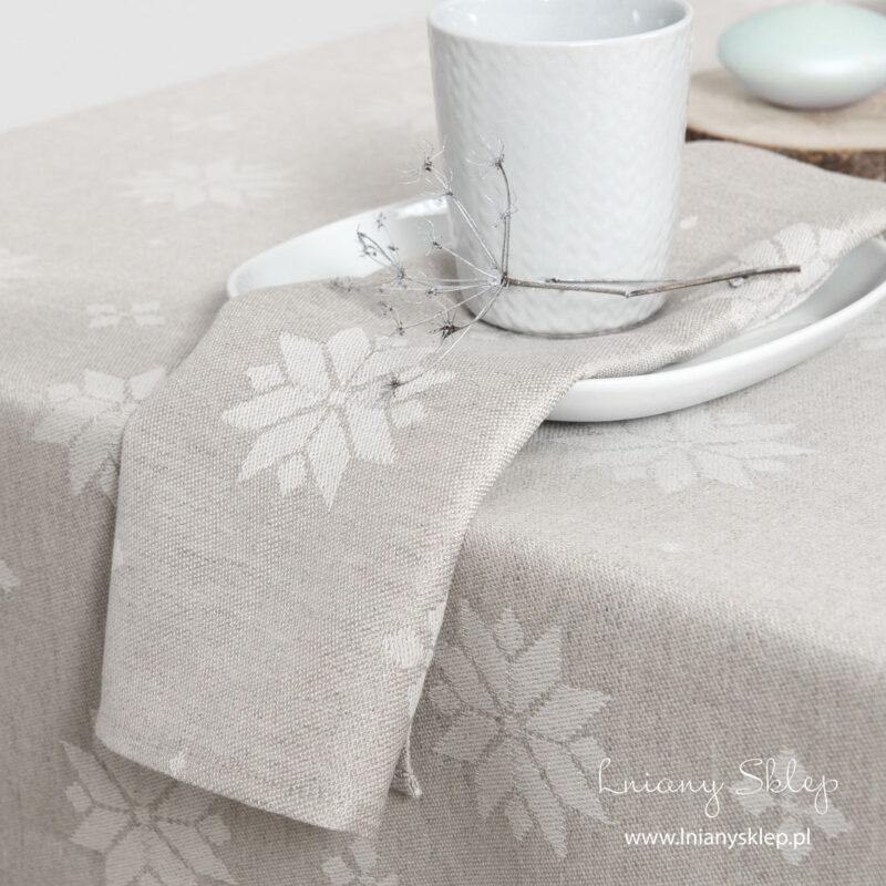 Lniano &ndash; bawełniana serwetka w gwiazdki.