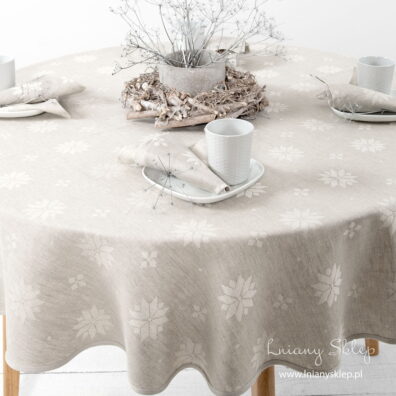 Obrus dwustronny: szare gwiazdki na białym tle i białe na szarym tle.