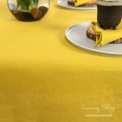 Jaskrawy żółty lniano-bawełniany dbrus wielkanocny.