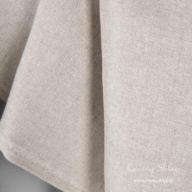 Piaskowa strona tkaniny dwustronnej.