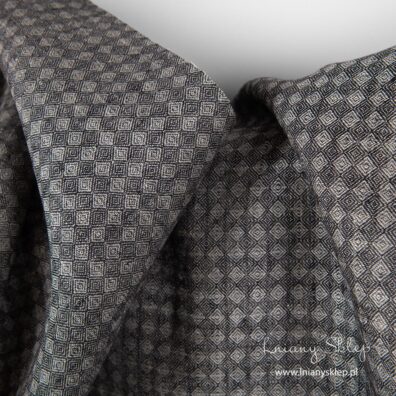 Szara tkanina lniana w drobne romby.