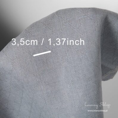 Tkanina lniana szara o niebieskim odcieniu ażurowa w romby. Wymiary.