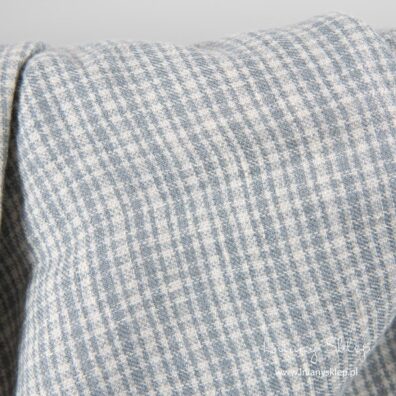 Prany len z wełną w biało - szarą krateczkę.