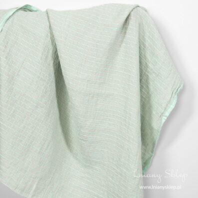 Tkanina lniana zielone wzory prana.