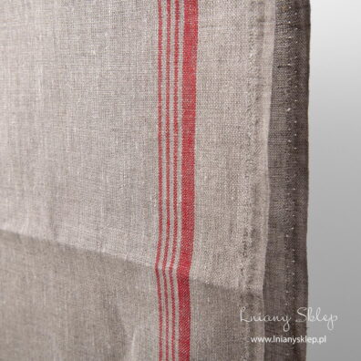 Len ścierkowy niebarwiony w paski czerwone na jednym z brzegów.