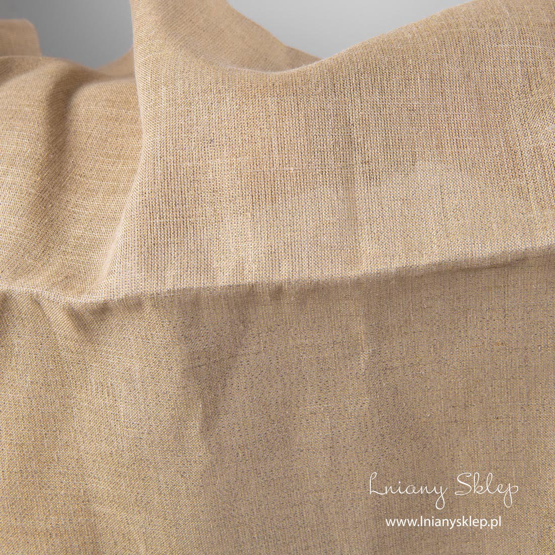 Połyskująca tkanina niebarwiony len.