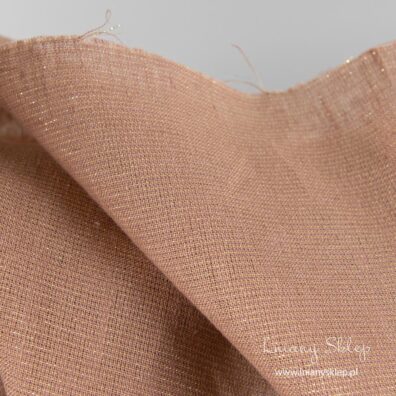 Lniana brązowa tkanina ze złotą nitką z poliesteru.