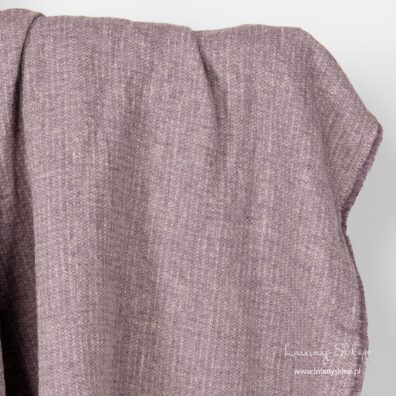 Prany fioletowy len w drobne romby.