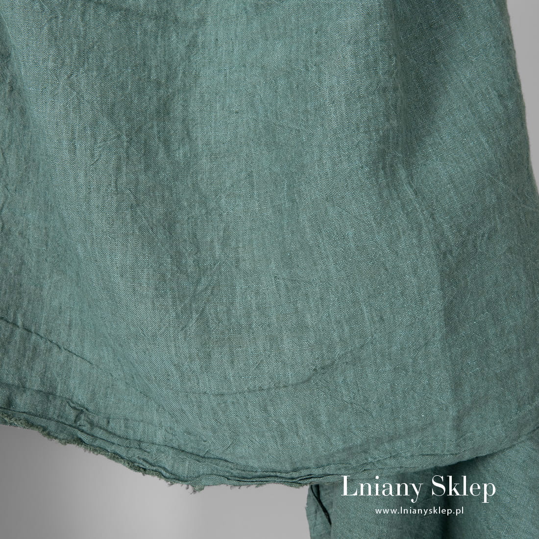 Zielony o niebieskim odcieniu prany szeroki len 100%.