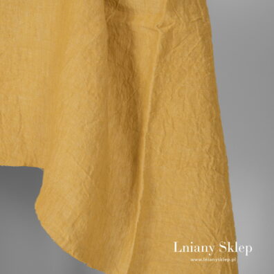 Szeroki prany len na zasłony i pościel.