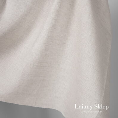 Piskowy szeroki len na zasłony i pościel.