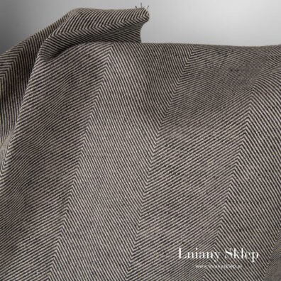 Tkanina w szary wzór jodełkowy. Szerokość 180 cm.