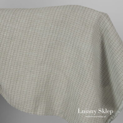 Zielonkawy prany len we wzorek.