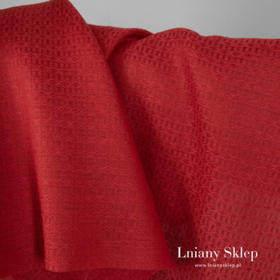 Czerwona tkanina w elegancki wzorek.