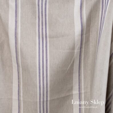 Mocny len w białe i fioletowe paski na beżowym tle.