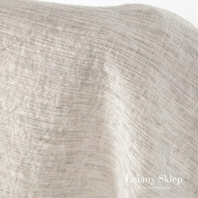 Piaskowo - biały melanż ze zgrubieniami.